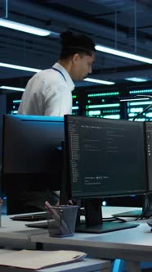 Vertical Video Computer Scientists in Data Center Managing and Maintaining Databases