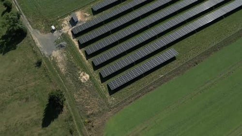 Aerial View of Solar Panel Farm in Farmland