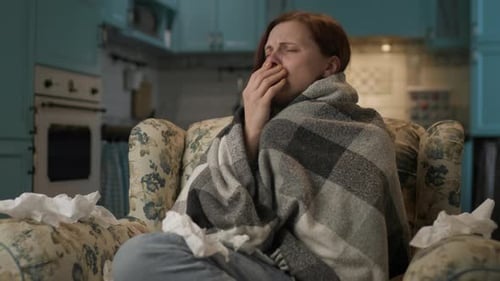 Woman Suffering From Cold Crying at Home