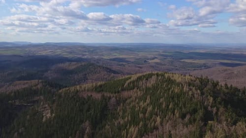 Drone Flight Over Mountains Covered with Forest and Valleys