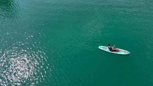 Aerial View Paddleboarding in the Green Canyon People Enjoy Swimming and Nature