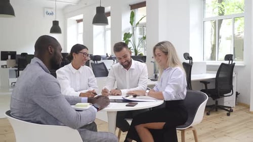 Multiethnic Business People During Meeting in Modern Office