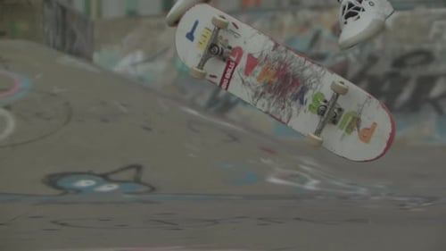 Extreme sports - Extreme slow motion kick flip on skateboard in park