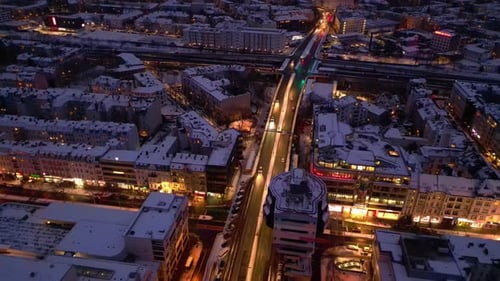 Berlin Steglitz shopping street in Snow at winter evening. Marvelous aerial view drone