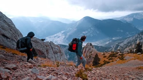Hikers Exploring Rugged Terrain in the Pyrenees of Spain During Autumn