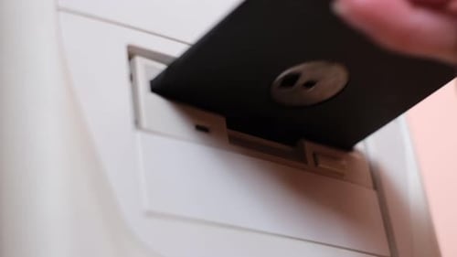 Old Floppy Disk and System Unit