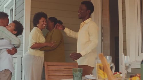 Family Reunion on Suburban Home's Porch