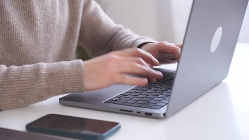Crop Man Working on Laptop