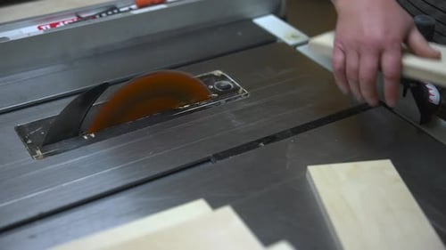 Workshop Scene With Skilled Craftsman At Work Lumberjack Carefully Makes Accurate Cuts On Wooden