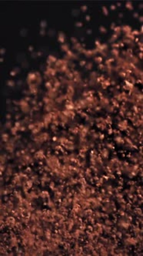 Ground Coffee Flies Up and Falls Down Filmed on a Highspeed Camera at 1000 Fps