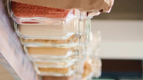 Dry Goods Storage in Glass Jars on Shelf