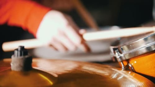 Drummer Playing Cymbals Close-up in Dark Studio