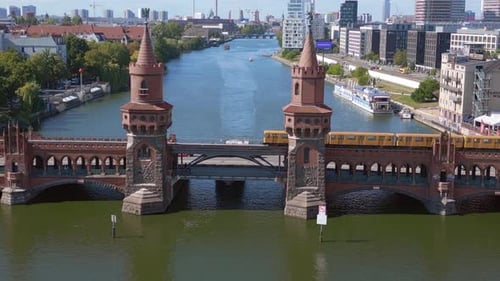ship subway River Bridge summer day east west Berlin Border Germany. Lovely aerial top view flight p