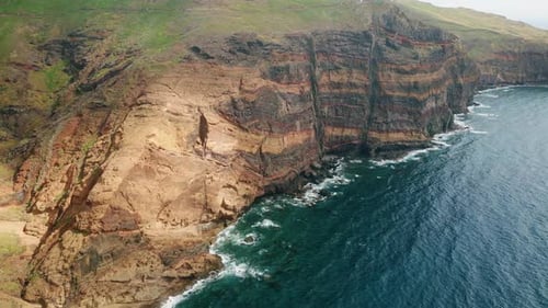 Ocean Washing Island Cliffs Drone View Amazing Travel Destination in Summer