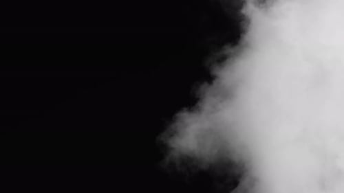 Nuages en mouvement sur fond noir Faites glisser et déposez sur votre chronologie pour appliquer un effet de fumée ou de nuage à