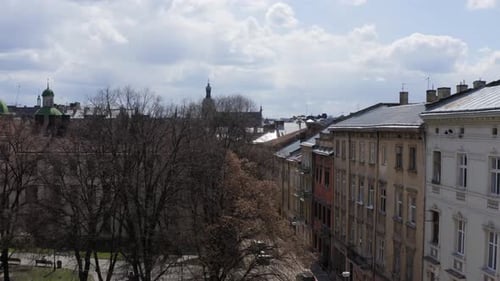 Aerial drone of Lviv Old town square from ground to rooftops Ukraine