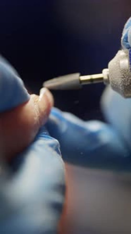 Closeup of a Manicure Machine While Removing Gel Polish From the Nail Plate