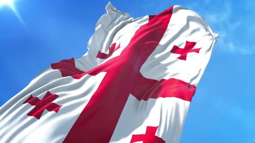 Realistic Waving Flag of Georgia in Blue Sky