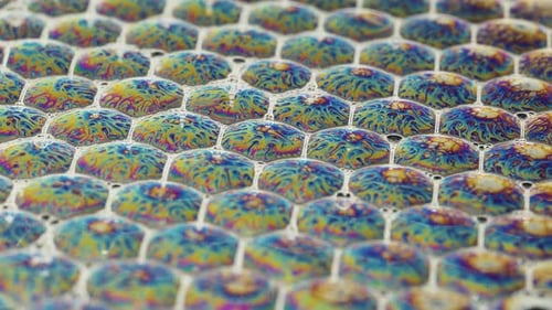 Abstraction soap bubbles. fire on bubbles. Ideal honeycomb shapes. macro.
