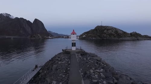 Reine Iconic Lighthouse A Scenic Spot on Lofoten's Rocky Norwegian Coast