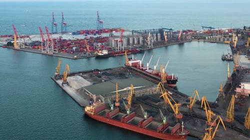Aerial View of Sea Port with Tower Cranes and Containers
