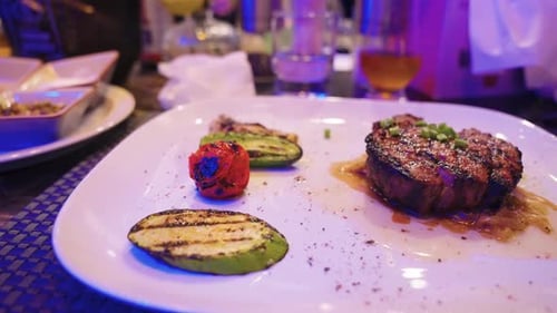 Steak and Vegetables on Plate Close Up