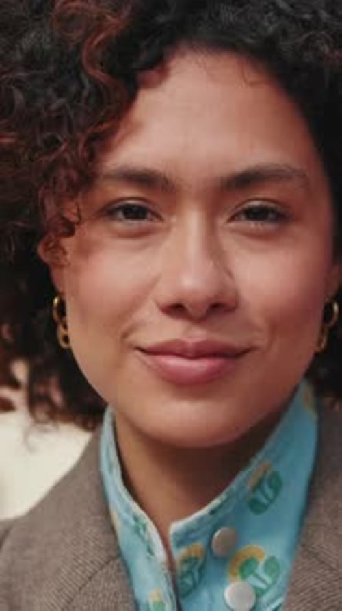 Vertical video, Portrait of a Happy Young Woman in The City
