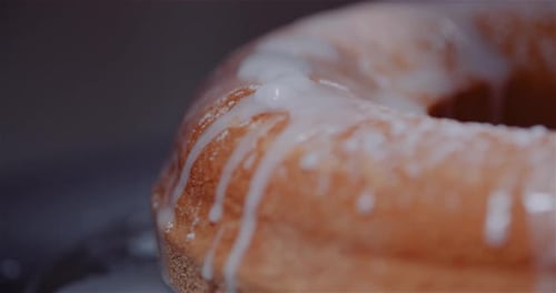 Icing Being Added to a Ring Cake
