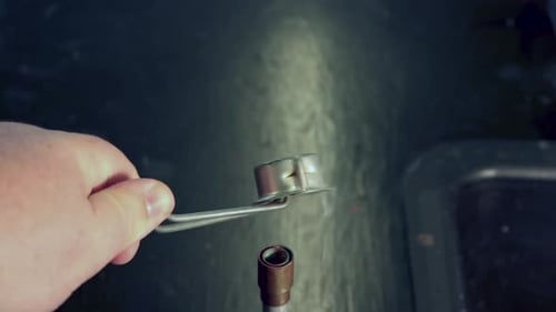 Close up of failed attempt to light bunsen burner with striker