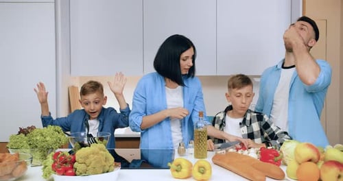 Family Cooking Together in the Kitchen