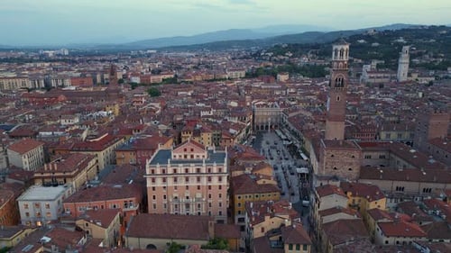 Aerial View of Verona's Historic Cityscape Showcasing Architecture and Mountainous Backdrop During