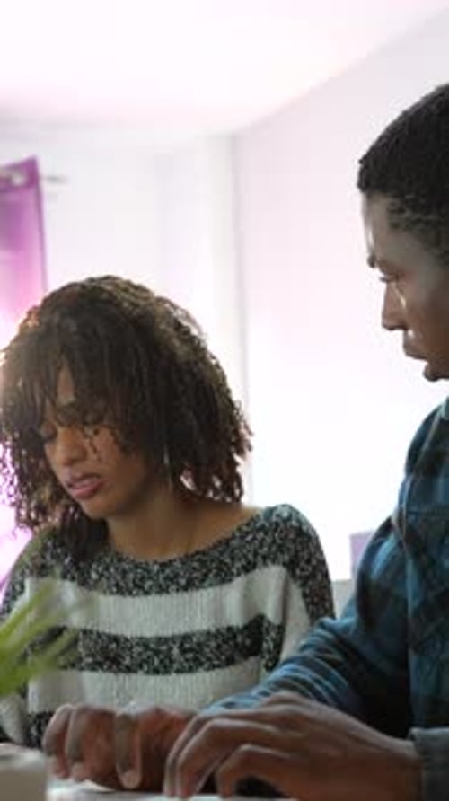 Young Adults Working Together at Home