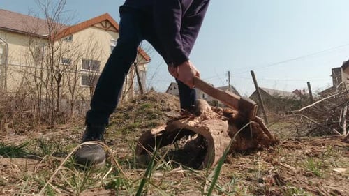 Strong Man Chopping Wood