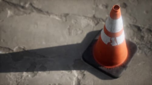 Orange and White Striped Traffic Cone