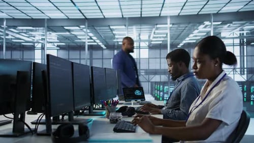 Data Center Engineers Maintaining Company Network Infrastructure