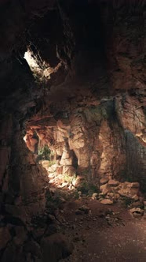Sunlight Filtering Through an Ancient Stone Cave