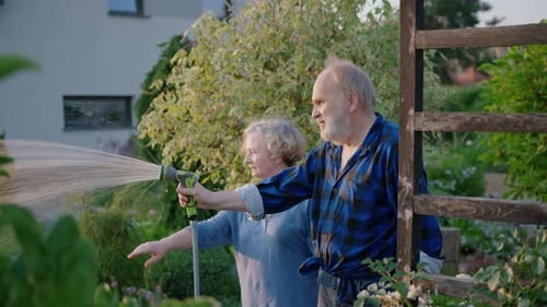 Seniors Watering Garden