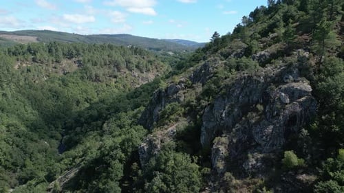 Forested Rocky Mountain With Rio Toxa In Silleda, Pontevedra, Spain. Aerial Drone Shot