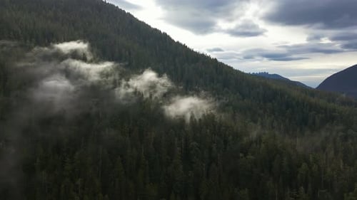Canadian Mountain Landscape Covered in Clouds Aerial Nature Background