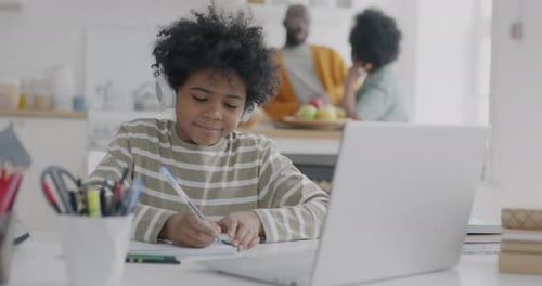 Child Learning Online with Parents in Background