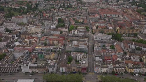 High Angle View of Blocks of Buildings in Residential Urban Neighbourhood Tilt Up Reveal Cityscape