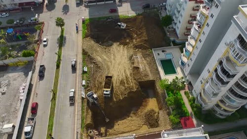 Aerial View of Construction Site with Heavy Equipment