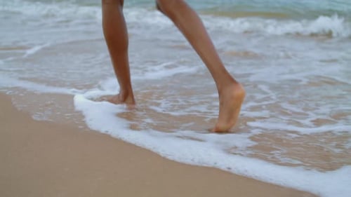 Closeup Legs Walking Ocean Beach