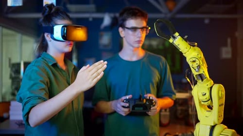 Young Adults Controlling Robot with VR in Workplace