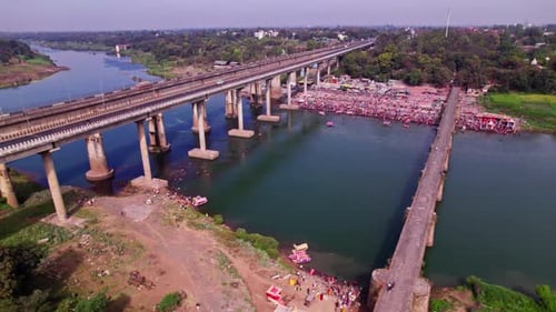 holy bath with Tilwara Narmada River Bridge at Narmada Ghat, Jotpur, Jabalpur, Madhya Pradesh, india
