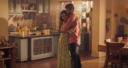 Young Couple Slow Dancing in the Kitchen with Romantic Passion and Tenderness. Sharing a Moment of