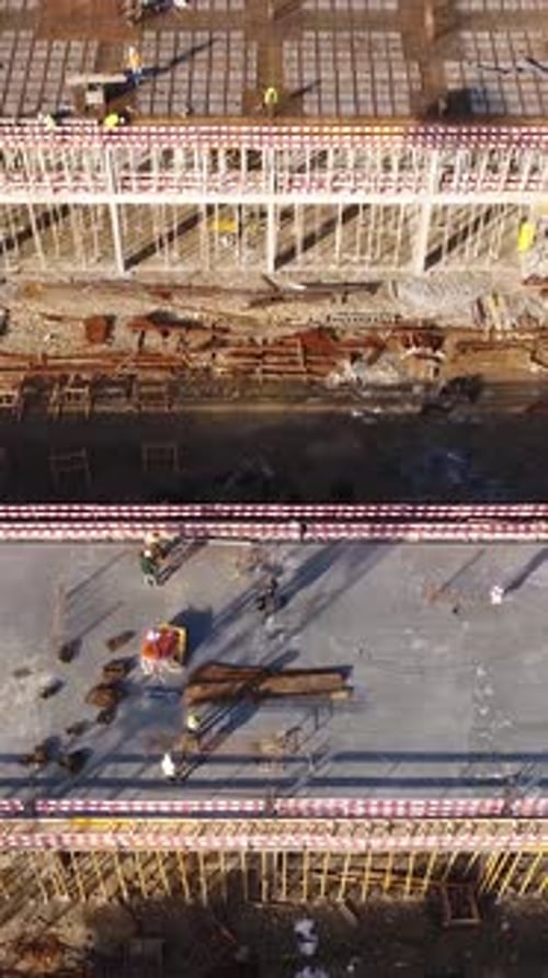 Aerial View of a Construction Site with Workers