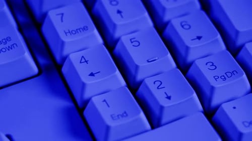 Cool Keyboard Close Up View in Blue Light