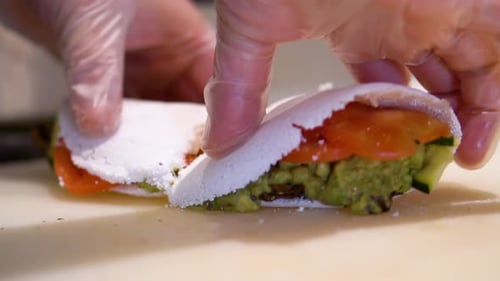 Chef Hands Preparing Fresh Tapioca Sandwiches