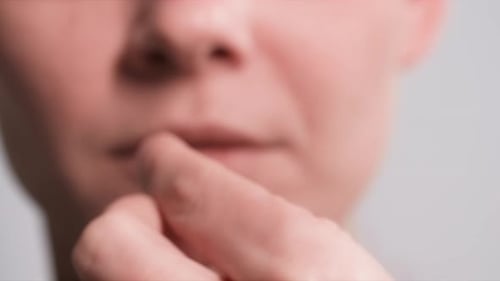 Woman Taking Pill With Water, Close Up